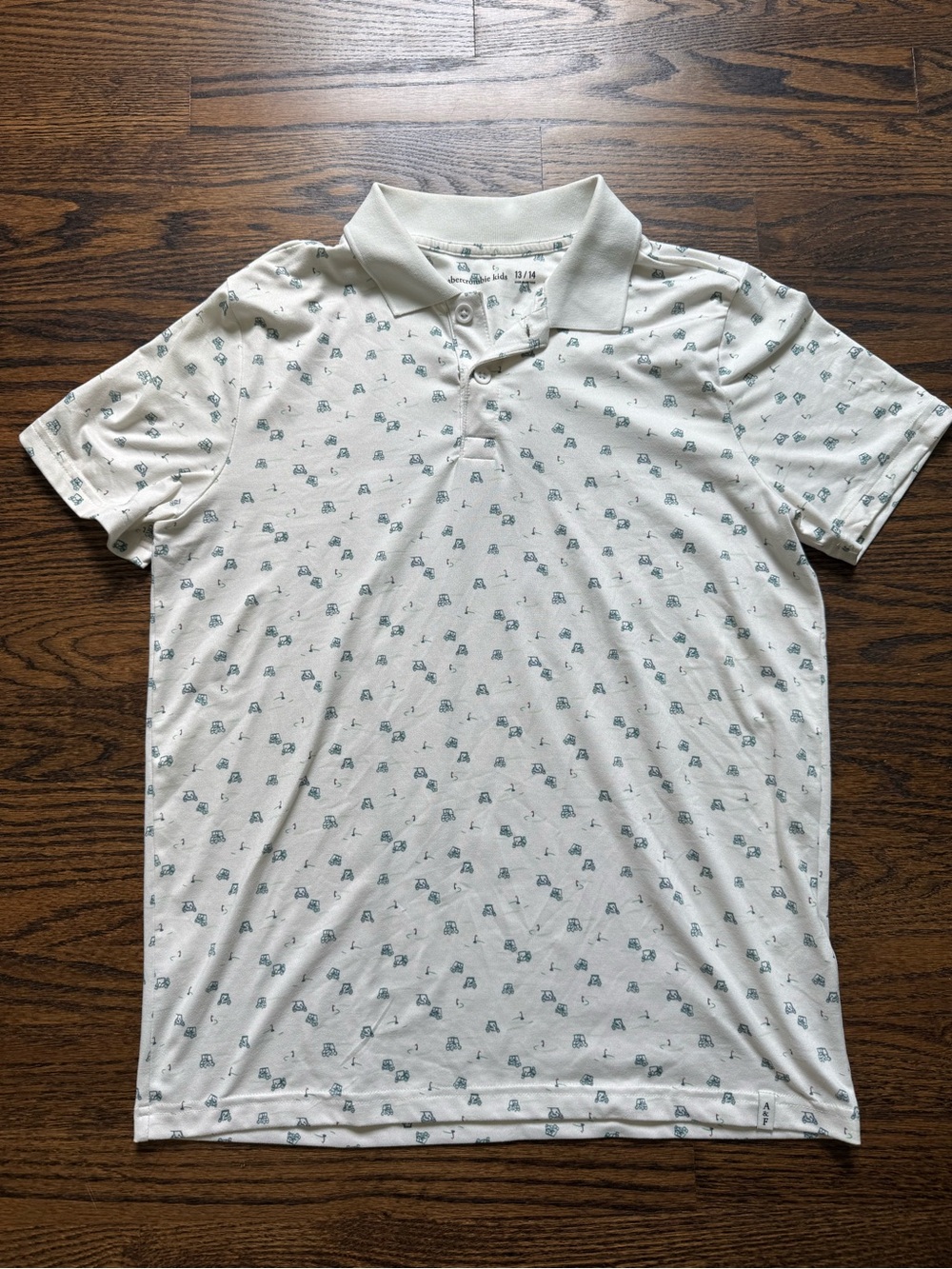 Boys White Polo Shirt with Green Golf Cart Print
